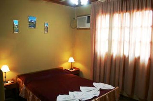 Residencial Arcoiris Hotel Пуерто Игуасу Стая снимка